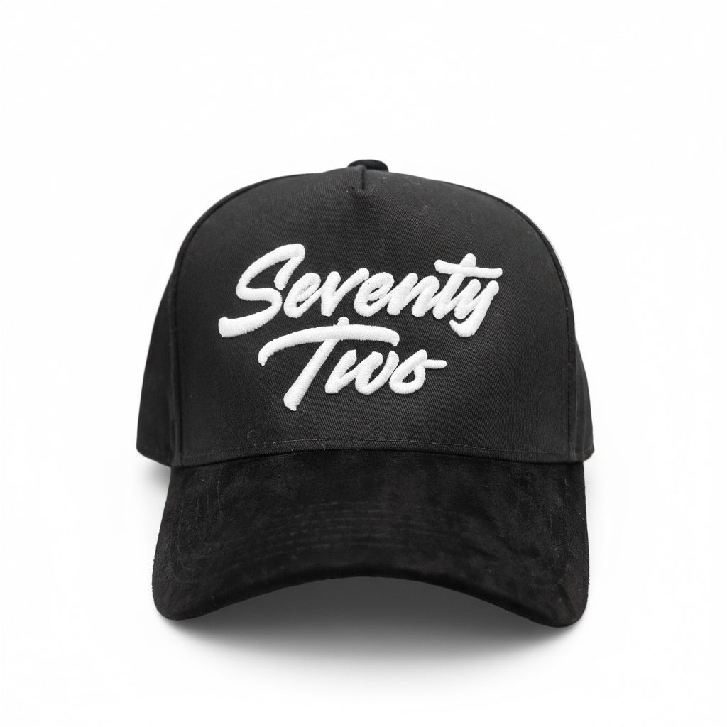 Black cap with 'Seventy Two' text in white on a white background